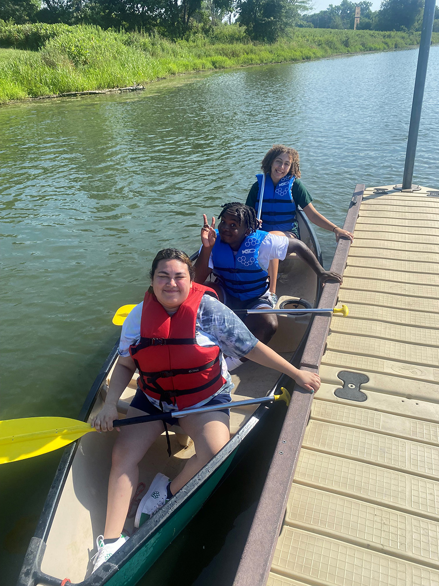 First-year students Emma Barbosa, Nate Lee and Amaira Peterson enjoyed canoeing at Mozingo Lake as part of Jump Start activities this fall. (Submitted photo)