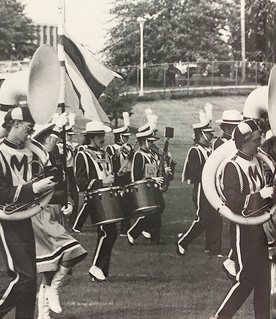 The Bearcat Marching Band performs at halftime of a Northwest football game in 1984. (1985 Tower yearbook)