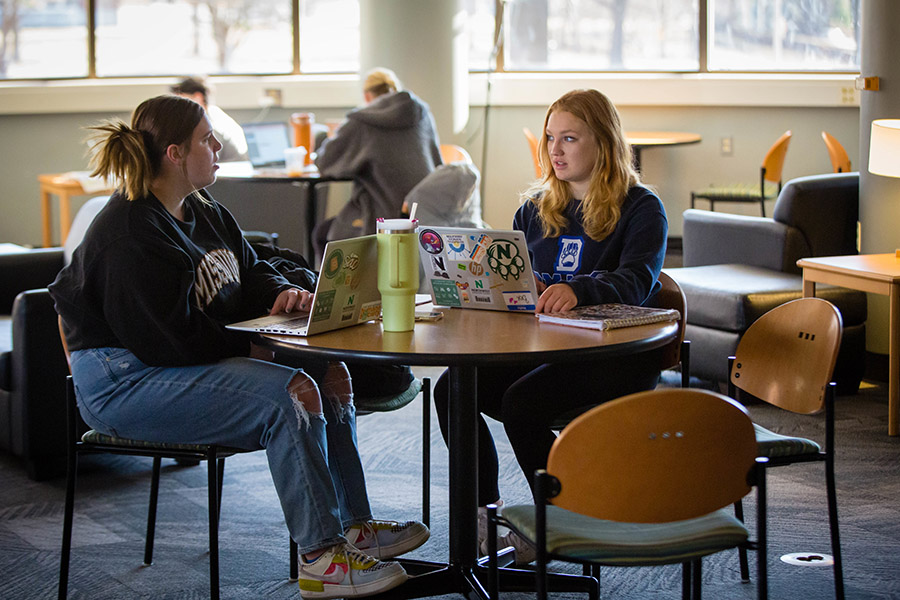 Students study in the B.D. Owens Library. In addition to textbooks, Northwest provides laptops to students as part of their tuition, ensuring they have access to the tools they need to be successful in the classroom. (Photo by Abigayle Rush/Northwest Missouri State University)