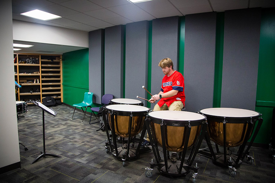 A Northwest percussion student practices in a refurbished studio in the Olive DeLuce Fine Arts Building. (Photo by Abigayle Rush/Northwest Missouri State University)