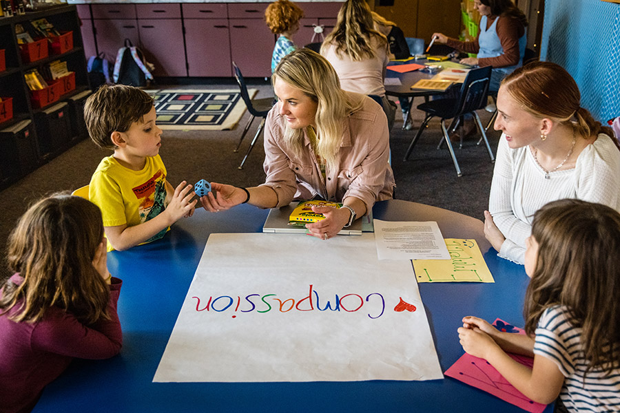 Small groups of Northwest and Horace Mann students talked about ways they could show kindness and compassion. (Photo by Lauren Adams/Northwest Missouri State University)