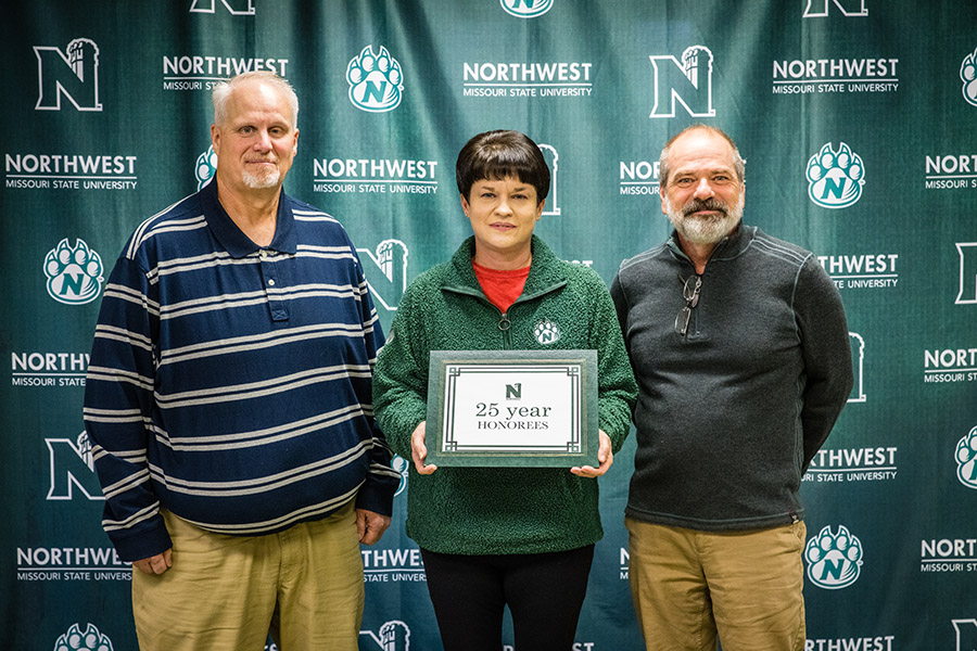 Left to right: 
Dr. Brian Haile, associate professor and chair, Department of Mathematics and Statistics;
Amee Wilmes, assistant director of financial assistance, Office of Financial Assistance;
Dr. Michael Steiner, associate provost of undergraduate studies and dean of the College of Arts and Sciences.