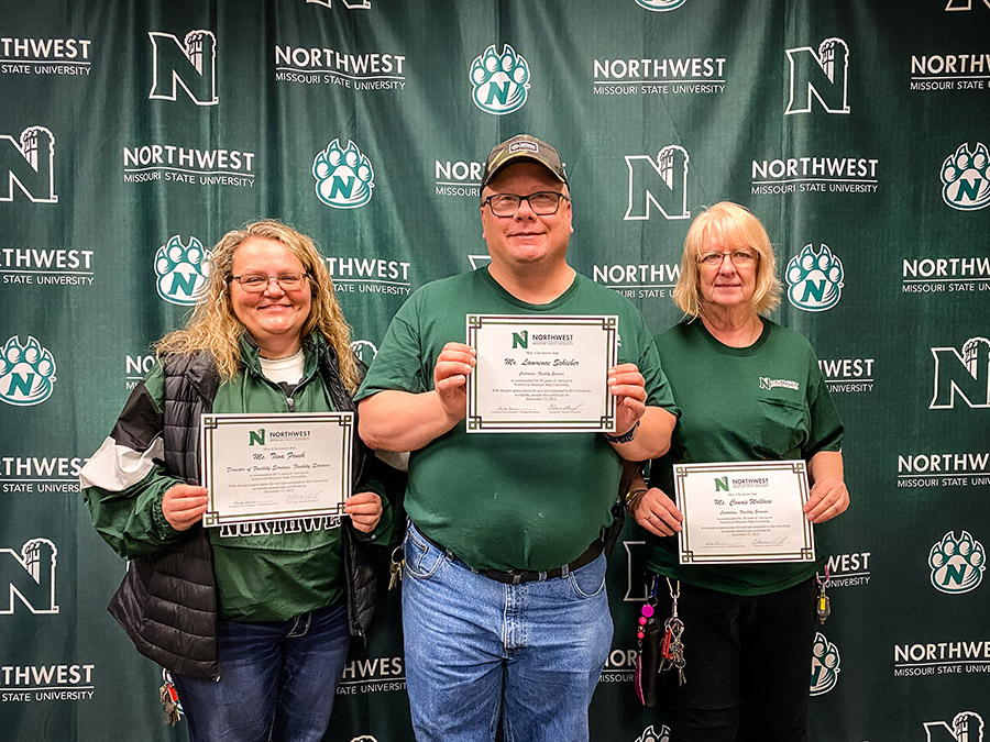 Left to right are Tina Frueh (five years), Lawrence Schieber (25 years) and Connie Wallace (10 years).