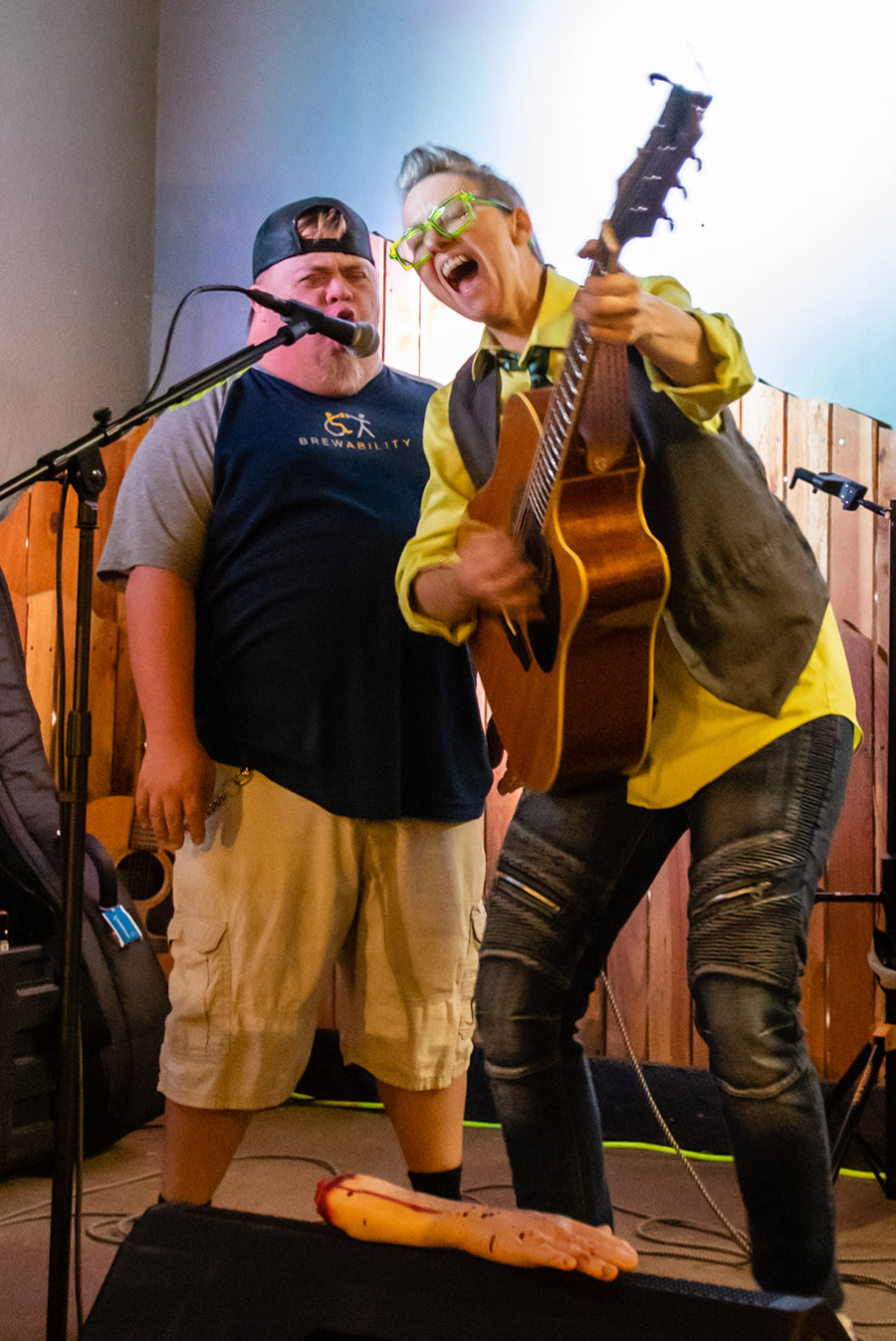 Brewability employee Jose sings with Dear Marsha during a Friday night at the Englewood, Colorado, bar and restaurant. 
