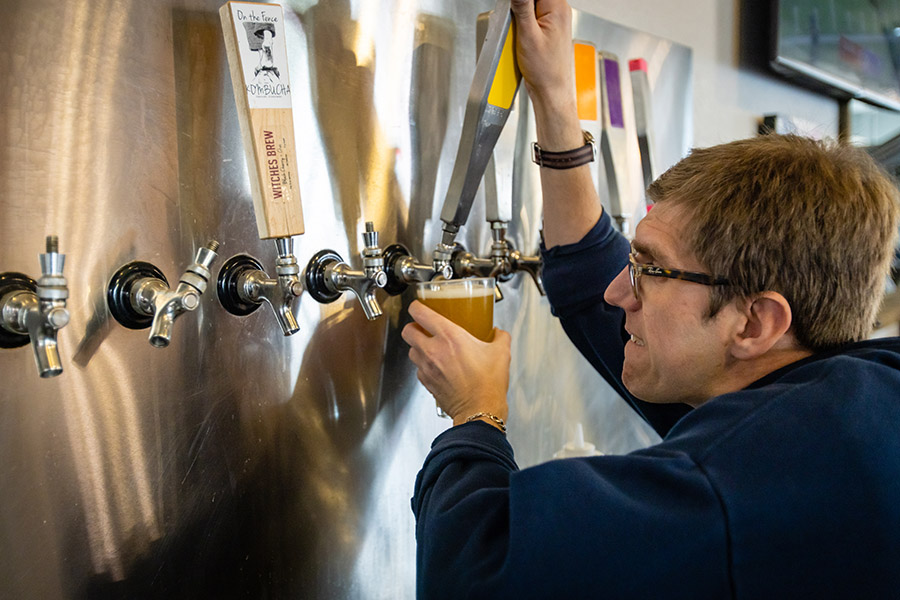 Alex, a 32-year-old bartender who is visually impaired and autistic, was one of Brewability’s ﬁrst employees. 
With his 8-year old guide dog nearby, he enjoys serving customers and talking sports with them. 