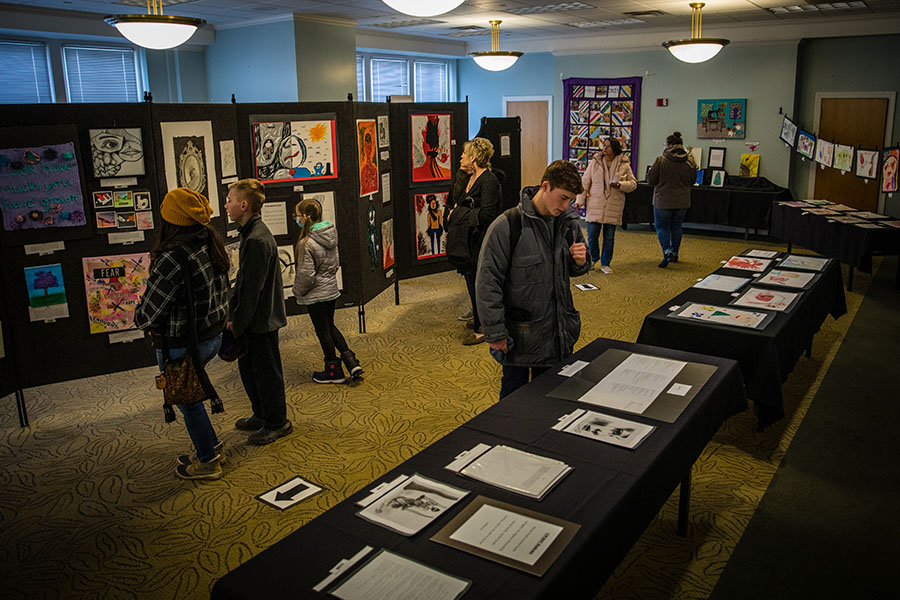 Patrons view an art exhibit during the 2022 "I Will Listen" event in the Student Union. (Photo by Lauren Adams/Northwest Missouri State University)