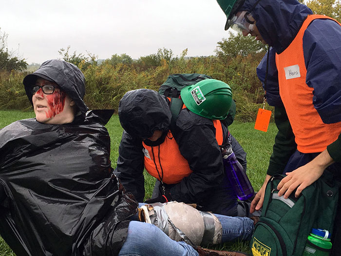 First responders treated a woman pretending to have an injured leg during the 2018 Missouri Hope emergency response field training exercise. Volunteers are needed to participate in this year's Missouri Hope exercise Oct. 4-6. (Northwest Missouri State University photos)