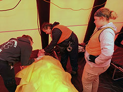 Nursing students tended to a patient inside a field hospital at Missouri Hope 2018. The Disaster Medical Operations Module of the exercise was designed to give medical students experience with a high surge of victims compared to typical care facilities. 