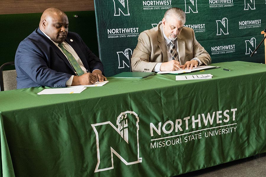 Northwest Interim President Dr. Clarence Green (left) and North Central President Dr. Lenny Klaver signed a series of agreements Wednesday that strengthen their institutional partnership and facilitate the transfer of students between them. (Photo by Lauren Adams/Northwest Missouri State University)