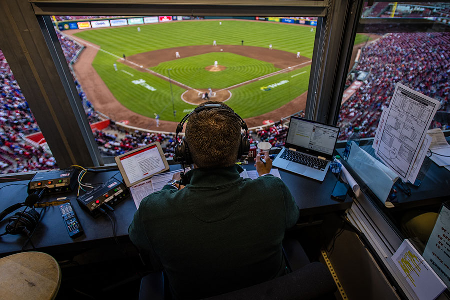 Tommy Thrall broadcasts a Cincinnati Reds baseball game at Great American Ball Park.