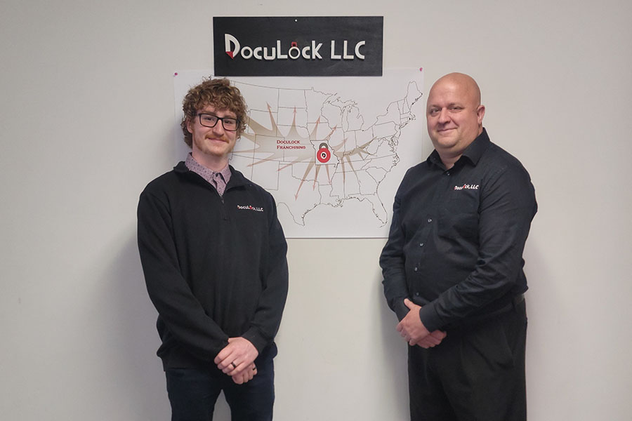 Recent Northwest graduate Spencer Engelman (left) is a new franchisee of DocuLock LLC, which Paul Janicek (right) founded in 2017. (Submitted photo)