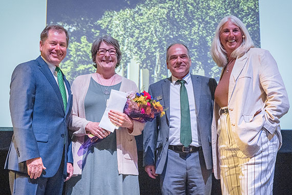 Left to right are Northwest President Dr. Lance Tatum, Assistant Professor of Music Dr. Debra Brown, Dean of the College of Arts and Sciences Dr. Mike Steiner and Provost Dr. Jamie Hooyman after Brown was announced Wednesday as the University's 2024 Governor’s Award for Excellence in Education recipient. (Photo by Lauren Adams/Northwest Missouri State University)