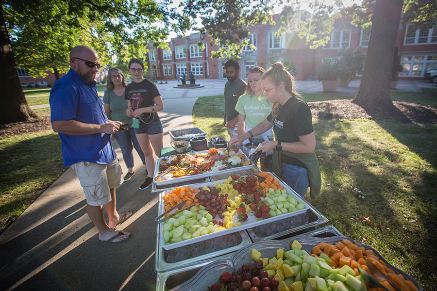 Families enjoyed a food buffet, music and yard games at the Memorial Bell Tower during last year's Family Weekend activities. (Northwest Missouri State University photos)