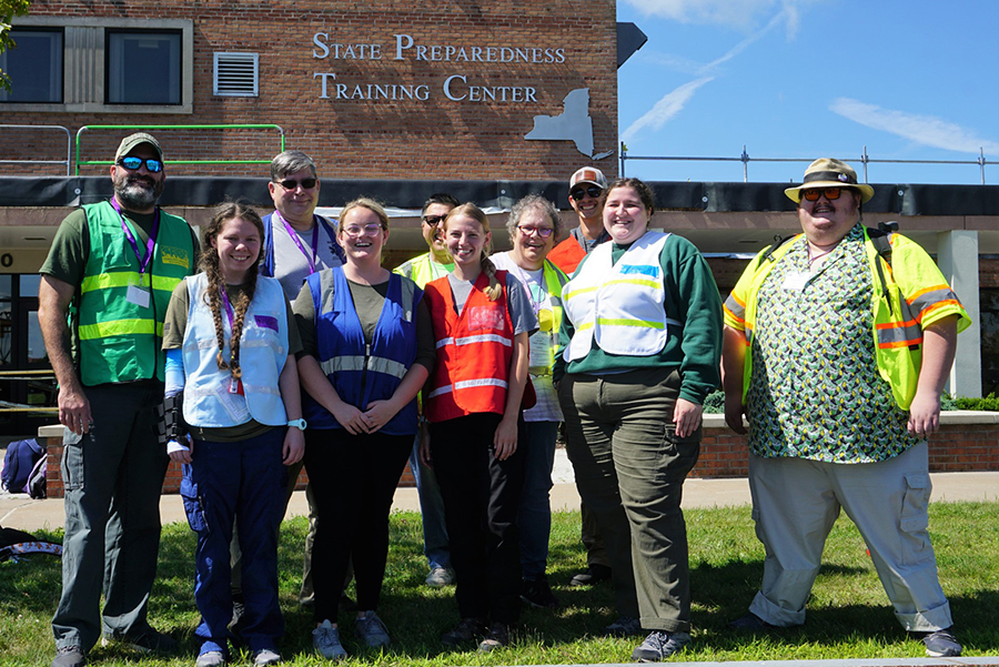 Pictured left to right while attending New York Hope in August are Travis Surprise, Kelsie Krier, Dr. Mark Corson, Mackenzie Baker, Richard Leach-Steffens, Sarian Blunk, Dr. Lauren Leach-Steffens, Michael Meyers, Racheal McWilliams and Lawrence Link. (Submitted photo)