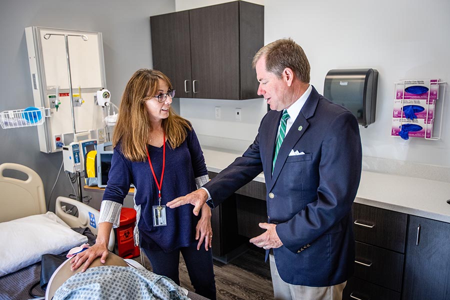 Northwest President Dr. Lance Tatum learns about the educational tools and opportunities available to nursing students at North Central Missouri College's Savannah Campus on Monday.