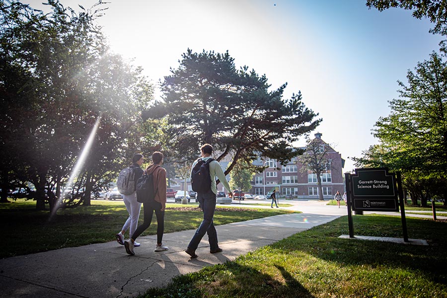 Students walk across the Northwest campus, which also is designated as the Missouri Arboretum. (Photo by Chandu Ravi Krishna/Northwest Missouri State University)