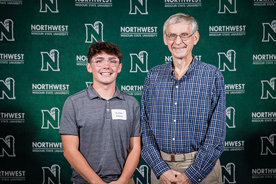 Hunter Ackley (left) is pictured with Clark Israel, a son of Lewis and Elda Israel, at Northwest's Powering Dreams celebration of donors and scholars in September. (Northwest Missouri State University photo)