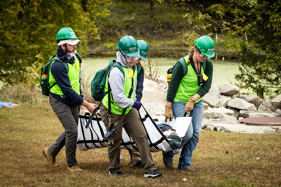 A team of first responders transports a victim to a treatment center during Missouri Hope. (Photo by Lauren Adams/Northwest Missouri State University)