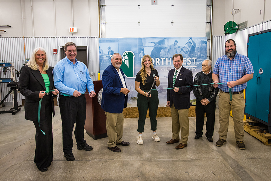 The Northwest community gathered Wednesday to celebrate the completion of its renovation of the McKemy Center with a ribbon-cutting ceremony. Pictured left to right are Northwest Provost Dr. Jamie Hooyman; Tim Melvin, production manager for assembly materials at Kawasaki Motors Manufacturing Corporation; Dr. Rod Barr, director of Northwest's School of Agricultural Sciences; Northwest student Meghan Hunerdosse; Northwest President Dr. Lance Tatum; Dr. Marvin Hoskey, a retired Northwest assistant professor of agriculture; and Matt Bax, a Northwest instructor of agricultural Sciences. (Photos by Lauren Adams/Northwest Missouri State University)