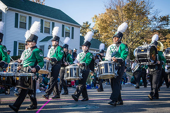The Bearcat Marching Band's drumline is pictured marching in Northwest's 2022 Homecoming parade. (Northwest Missouri State University photo)