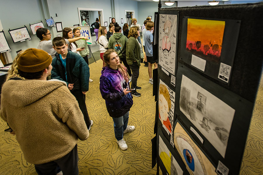 The Northwest community takes in art displayed during the University's 2023 I Will Listen event. (Photo by Lauren Adams/Northwest Missouri State University)