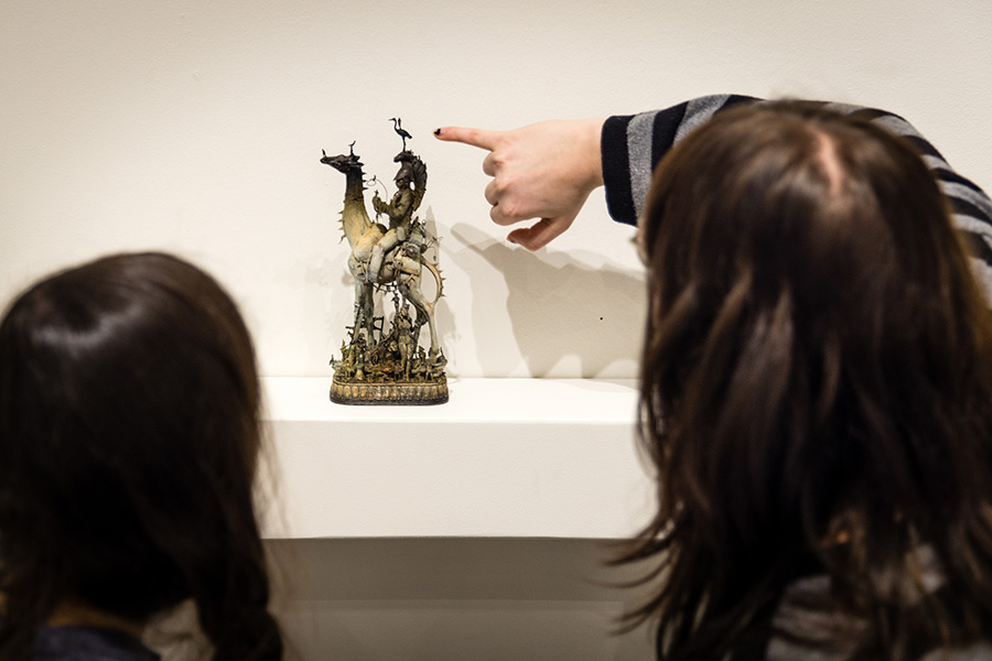 Students examined some of Kuksi's work in the Olive DeLuce Art Gallery before creating sculptures of their own using his techniques.