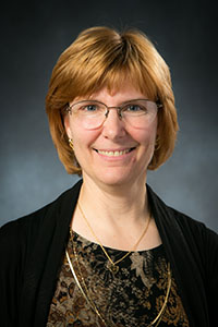 Dr. Christine Benson