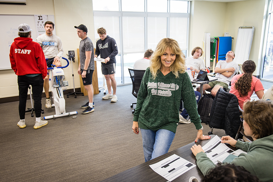 Dr. Tina Gaa Pulley, pictured with students during an exercise testing class this spring, leads Northwest's Exercise is Medicine initiative. (Photo by Lauren Adams/Northwest Missouri State University)
 