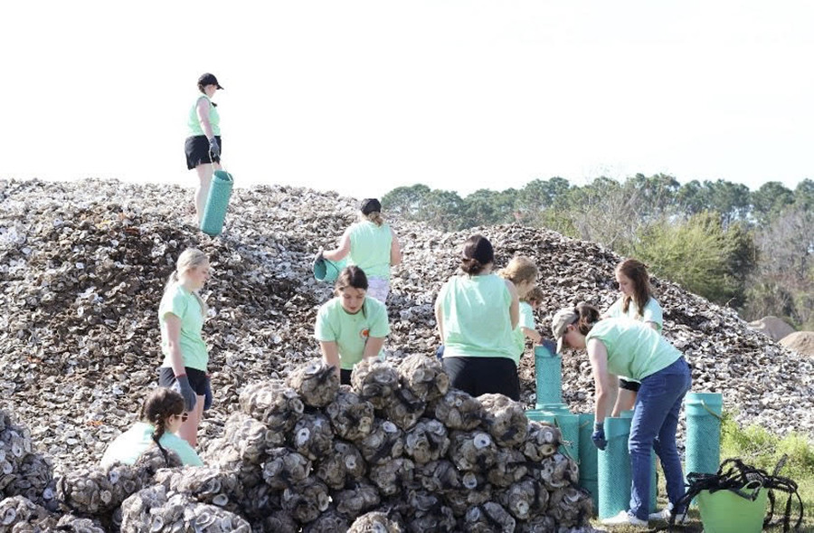Northwest's Alternative Spring Break student organization traveled in March to Rosemary Beach, Florida, where their work included bagging oyster shells as part of a reef reforestation project. (Submitted photo)