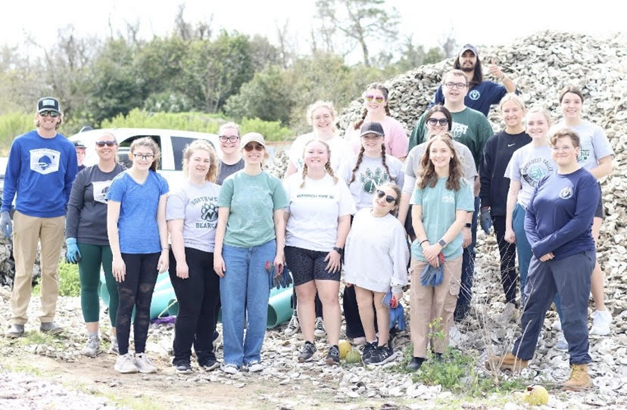 The student members of Northwest's Alternative Spring Break organization during their visit to Rosemary Beach, Florida, in March.