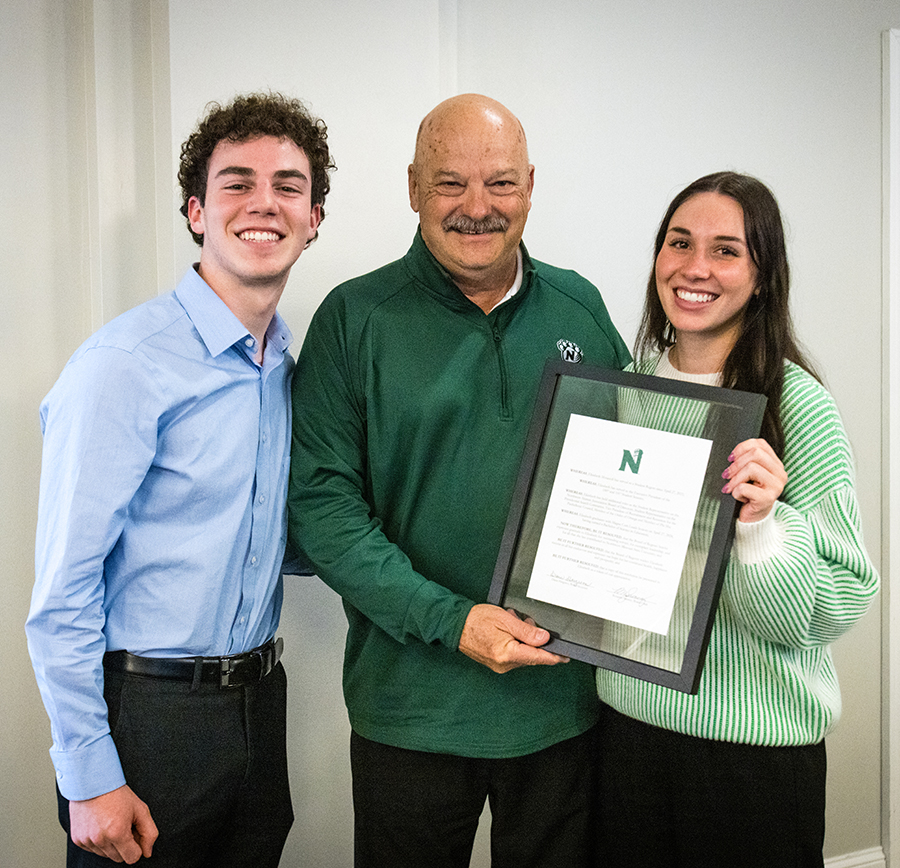 Elizabeth Motazedi (right) is pictured with her brother, Phillip Motazedi, and Regent John Moore. (Photo by Lauren Adams/Northwest Missouri State University)