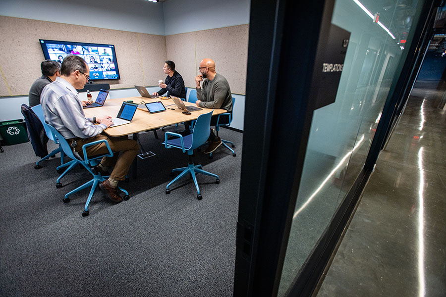 Bilal Clarance participates in a meeting with other Google team leaders.