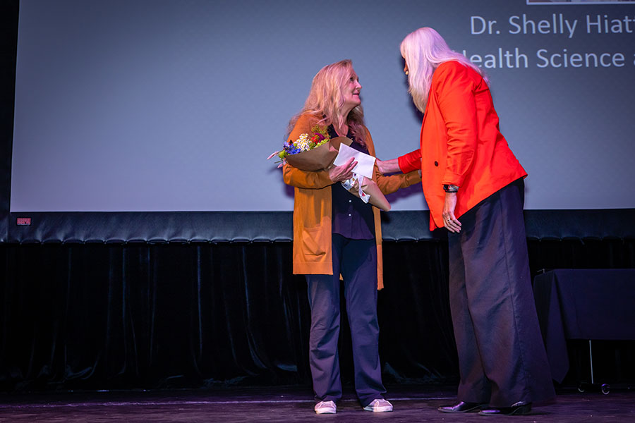 Northwest Provost Dr. Jamie Hooyman (right) congratulates Dr. Shelly Hiatt after she was announced as the University's Governor’s Award for Excellence in Education recipient. (Photo by Todd Weddle/Northwest Missouri  State University)