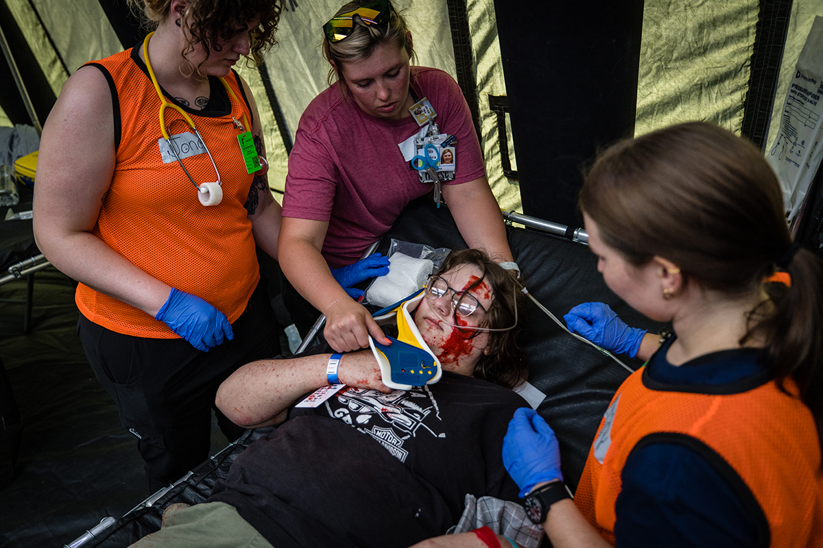 Medical staff and students tended to victims at a field hospital during Missouri Hope.