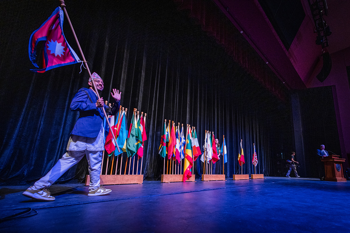International students represent their home countries during Northwest's annual International Flag-Raising Ceremony during Homecoming week. (Photo by Todd Weddle/Northwest Missouri State University)