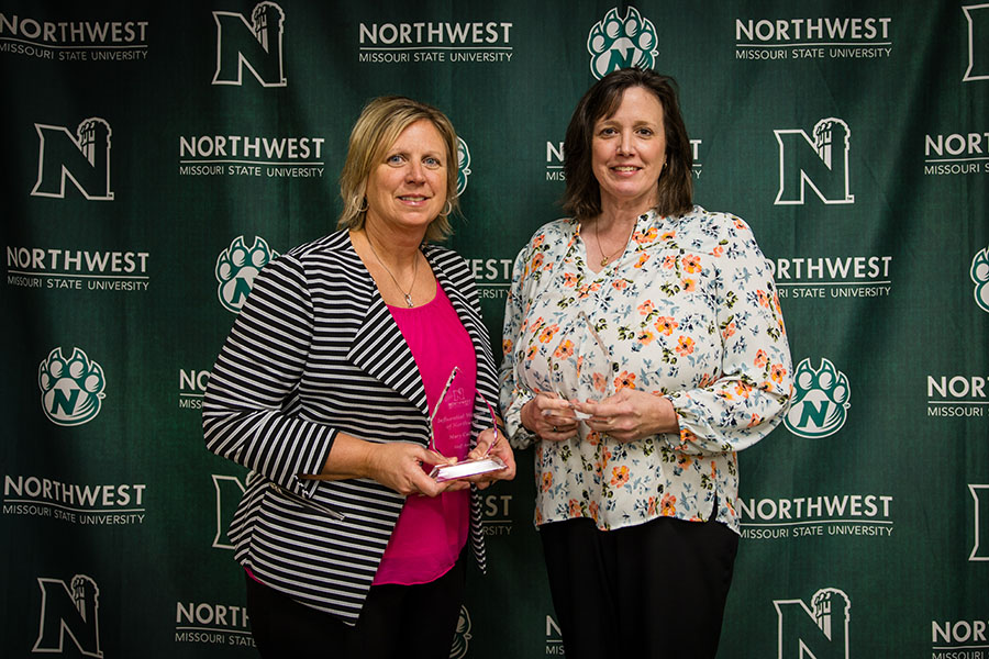 Mary Collins and Diane Hargrave were presented Tuesday with Influential Woman leadership awards. Two student recipients, Austyn Fisher and Shaviyah Sese, could not attend the presentation. (Photo by Lilly Cook/Northwest Missouri State University)