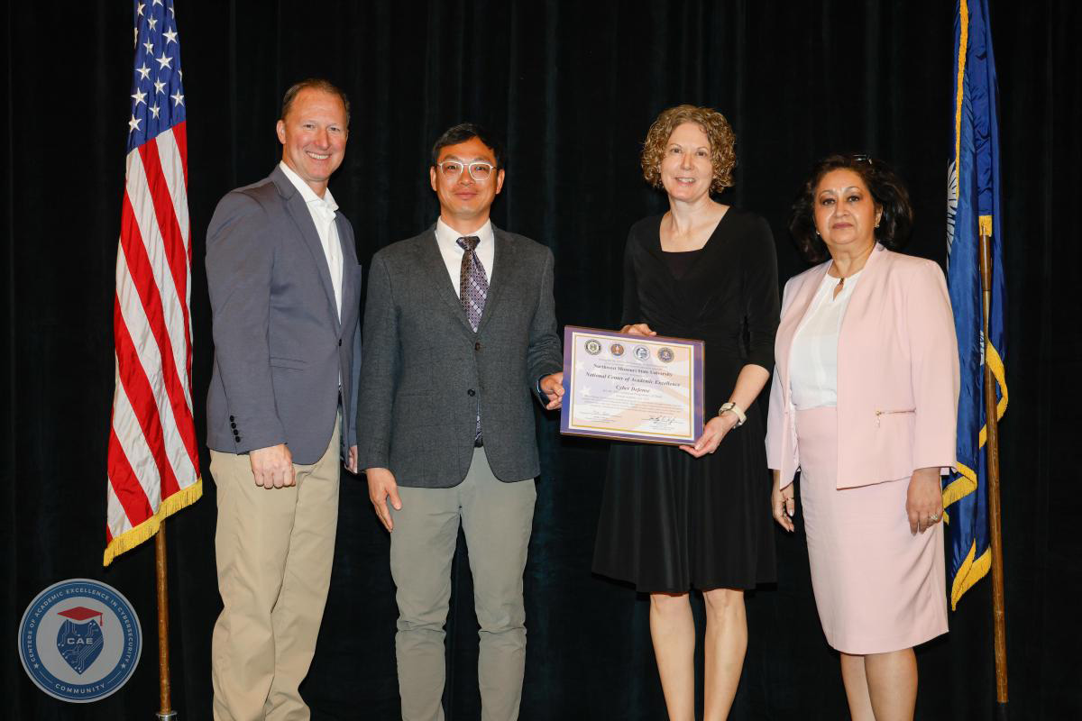 Northwest faculty Dr. Jerry Qin and Dr. Joni Adkins, center, accepted the University's designation as a National Center of Academic Excellence in Cyber Defense during the Center of Academic Excellence In Cybersecurity Community Symposium in April in Charleston, South Carolina. (Submitted photo)