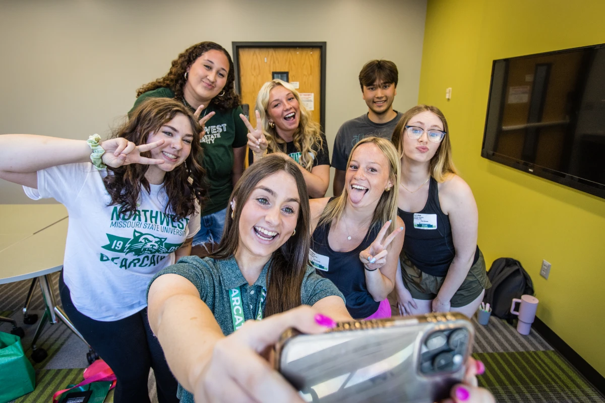 Students take a selfie with their SOAR leader.